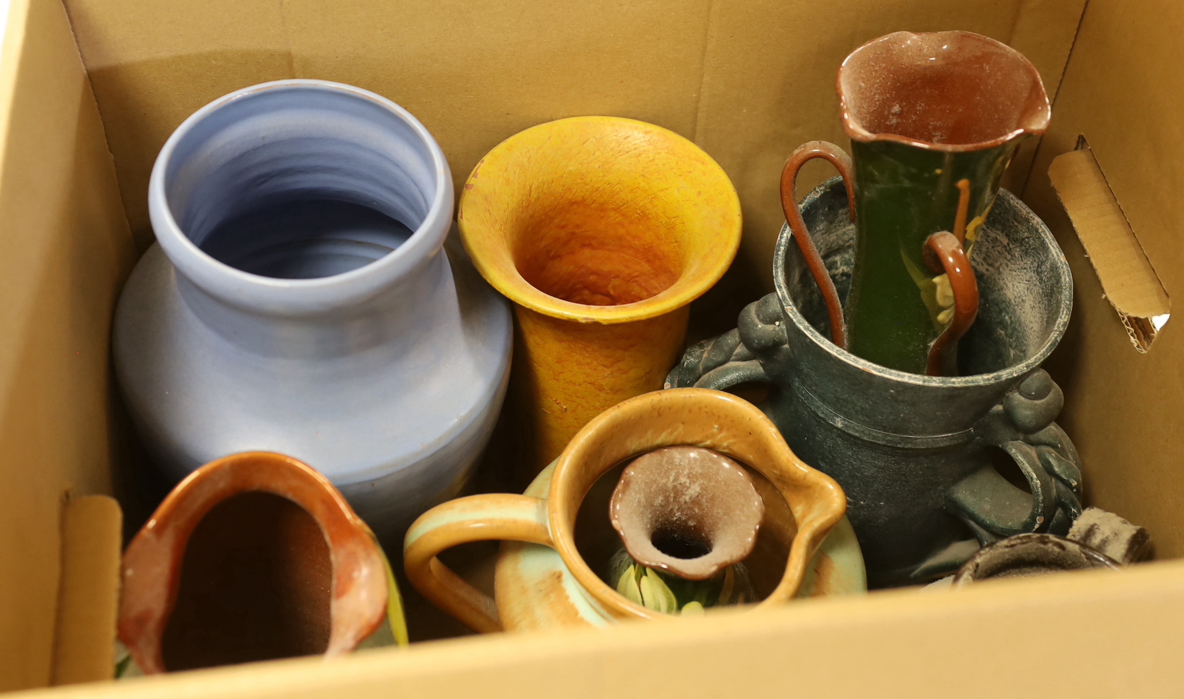 A large collection of assorted glazed Dickerware vases, jugs and pots